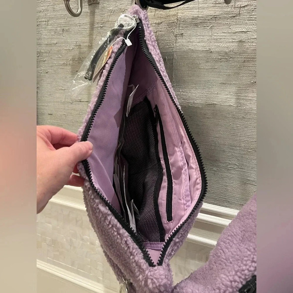 NWT new FREE PEOPLE overachiever Sherpa sling bag lavender purple fuzzy teddy - Picture 9 of 17